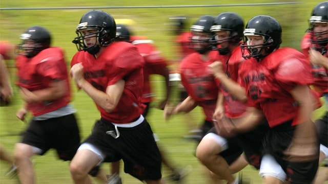 Debate over letting high school kids play football