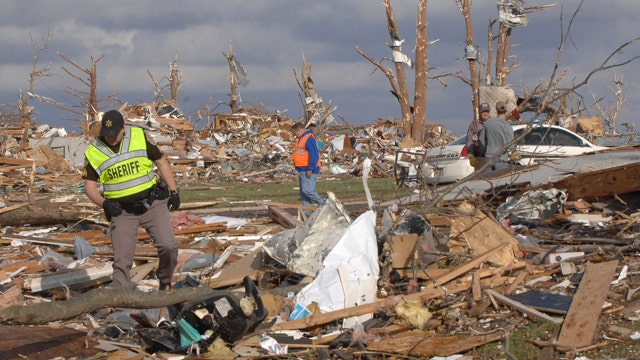 Late-season tornadoes leave path of death and destruction