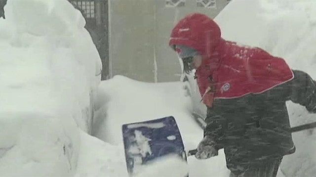 Record-breaking snowfall buries parts of northern US