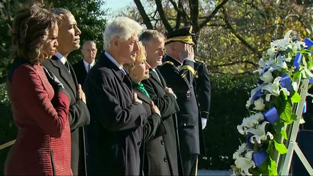 Obama lays wreath at JFK Memorial and grave site 