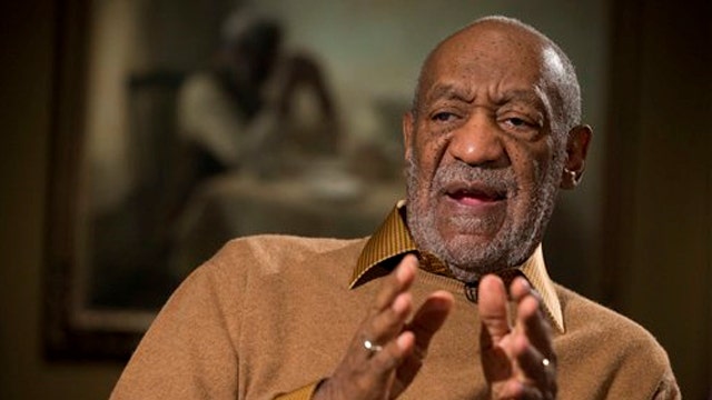 Cosby pressures AP reporter