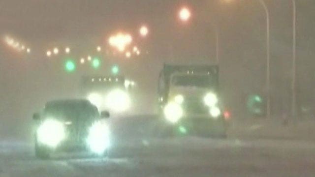 Wintry mix slows millions of holiday travelers