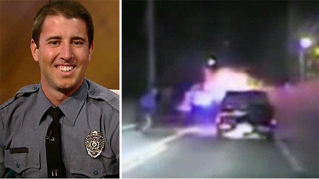 Daring rescue: Cop pulls man from burning truck