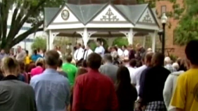 Atheist group sues Florida city over prayer vigil