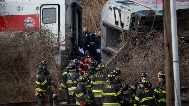 At least 4 dead, 63 injured in Metro-North train derailment