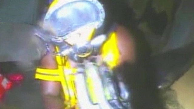 Shipwrecked crewman rescued after spending days underwater