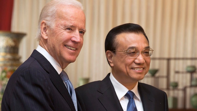 Biden urges China to take steps to lower tensions in region