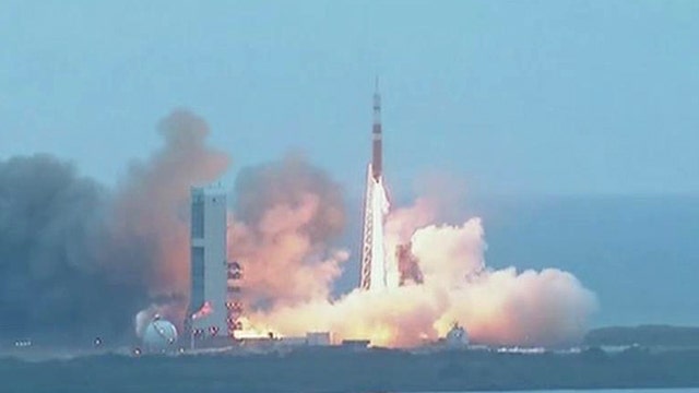 NASA's Orion spacecraft blasts off in historic test flight