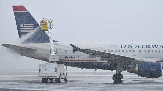 Heavy snow, rain and ice create miserable travel conditions