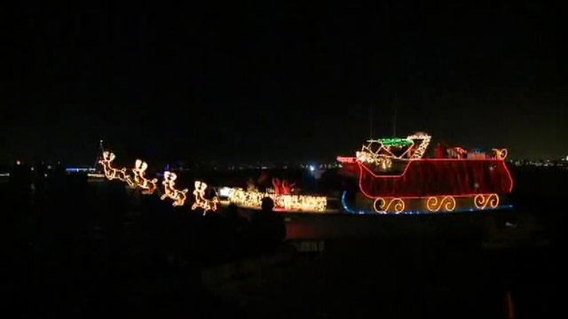 Boats replace floats in a parade of lights