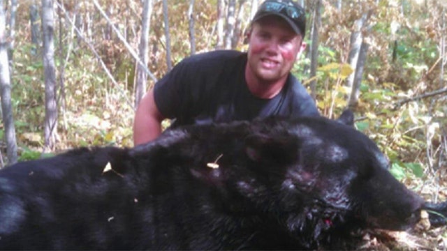 Man fights off vicious bear with a knife