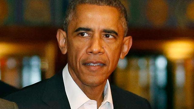 Obama taking fire from both sides over CIA report