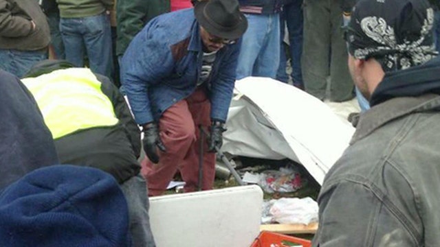 Hot dog vendor comes under attack at Michigan union protest