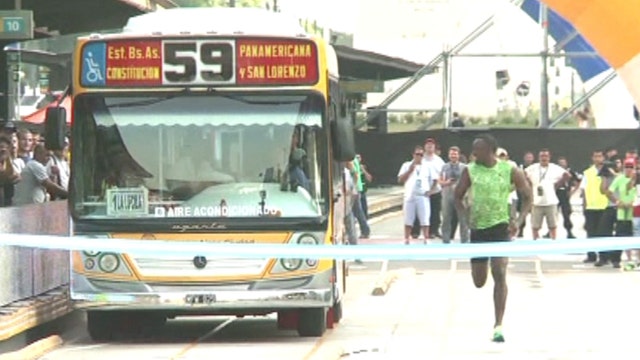 Bolt vs. bus: World's fastest man races transit vehicle
