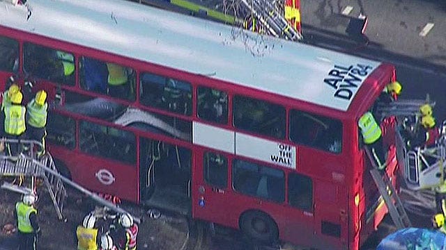 Double decker bus crashes in London