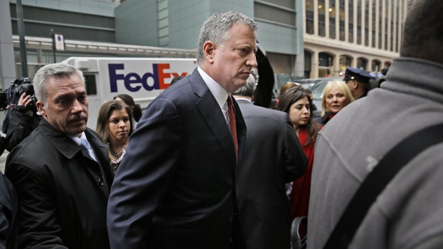 Mayor Bill de Blasio under fire after murder of NYPD cops