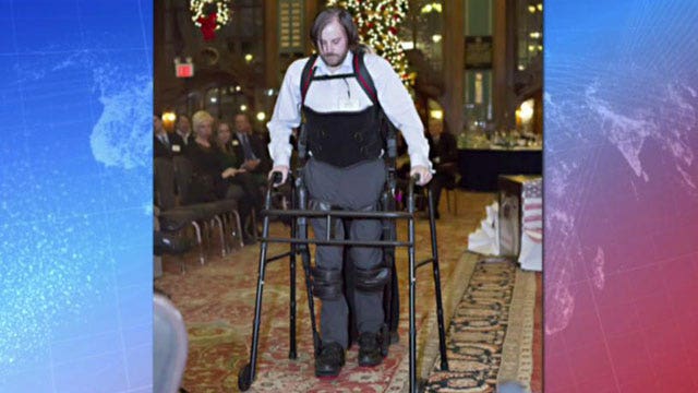 Robotic legs help wounded warriors walk