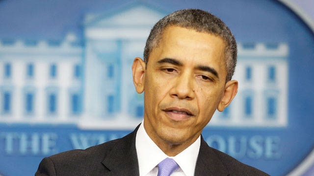 President defends ObamaCare to press