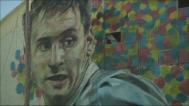 Street artists create mural of Lionel Messi