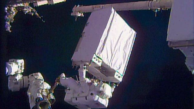 Astronauts take second spacewalk to fix cooling system