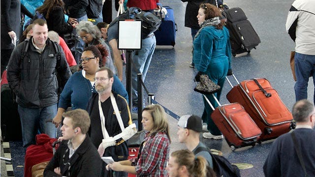 Winter storm creates holiday headaches for travelers