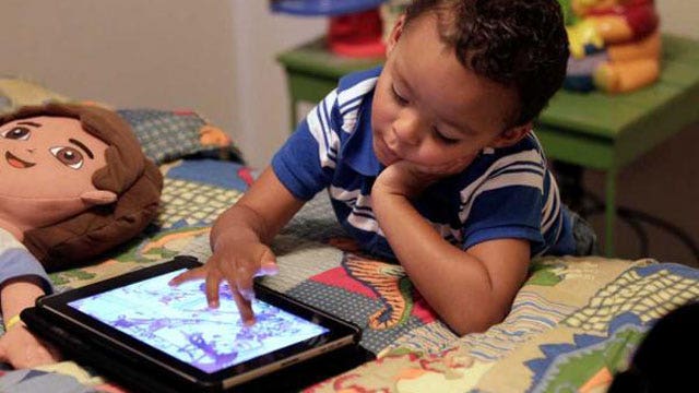 Does technology hinder or help child development?