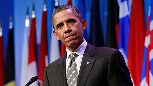 President Obama warns GOP he will use veto pen in 2015