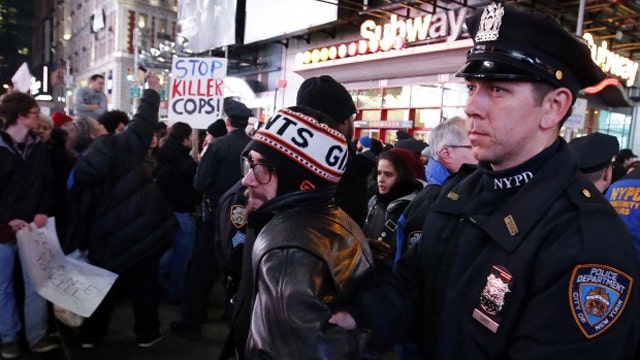 More officers coming under fire amid anti-police protests
