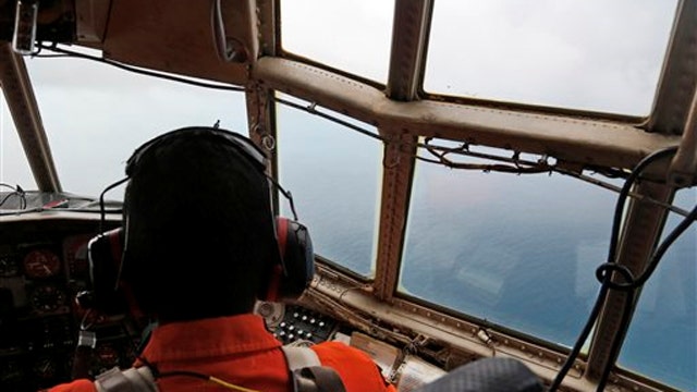 Bodies, debris found near where AirAsia flight disappeared