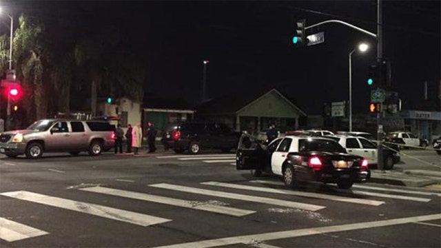 Police searching for gunman who fired on LAPD officers