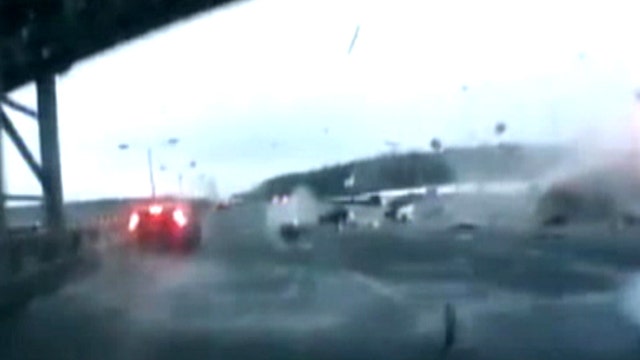 Deadly plane crash debris litters highway
