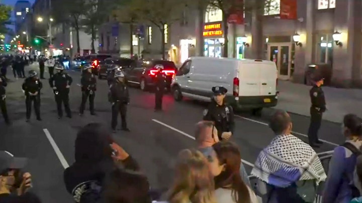 NYPD officers in riot gear enter Columbia's campus where agitators have occupied building