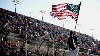 NASCAR star's daughter honors father's victory with patriotic gesture at school