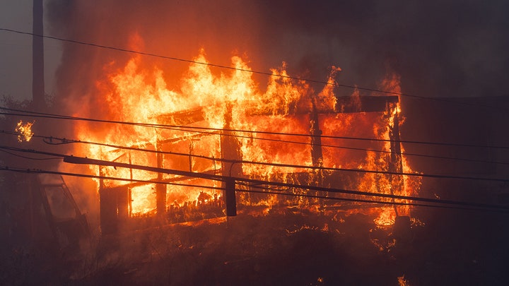 burning building power lines - Fox News