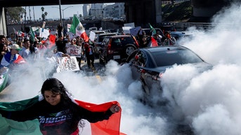 Anti-deportation protesters block major freeway, spray graffiti amid Trump crackdown - Fox News