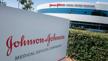 An entry sign to the Johnson & Johnson campus shows their logo in Irvine, California on August 28, 2019. - The US pharmaceutical industry faces tens of billions of dollars in potential damage payments for fueling the opioid addiction crisis after Oklahoma won a $572 million judgment against drugmaker Johnson &amp; Johnson. (Photo by Mark RALSTON / AFP) (Photo by MARK RALSTON/AFP via Getty Images)