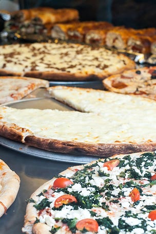 Pizza cost TOPS subway swipe in NYC