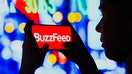 BRAZIL - 2022/06/06: In this photo illustration, a silhouetted woman holds a smartphone with the BuzzFeed logo displayed on the screen. (Photo Illustration by Rafael Henrique/SOPA Images/LightRocket via Getty Images)