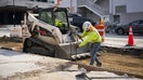 A construction worker hammers a beam while renovating a road in the Union Market district in Washington, DC, US, on Friday, Sept. 8, 2023. US employment gains will slow significantly and be more concentrated across few sectors in the decade through 2032 as population growth moderates, fresh government estimates show.