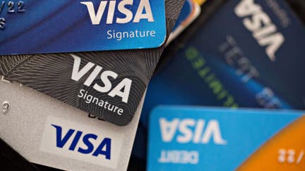Visa Inc. credit and debit cards are arranged for a photograph in Washington, D.C., U.S., on Monday, April 22, 2019.