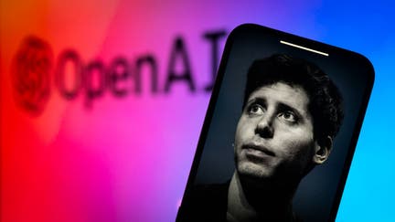 An effigy of former OpenAI CEO Sam Altman is seen on a mobile device screen in this illustration photo taken in Warsaw, Poland on 21 November, 2023. Former head of OpenAI Sam Altman has said he is still willing to lead the company after his ousting if two board members resign according to The Verge. 