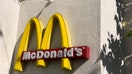The McDonald&apos;s logo is seen near the restaurant in Santa Monica, United States on November 13, 2023. McDonald&apos;s franchise owner Scott Roderick revealed that California&apos;s new minimum wage law has placed multiple economic hardships on his restaurants, during an appearance on &lsquo;Varney &amp; Co.&rsquo; (Photo by Jakub Porzycki/NurPhoto via Getty Images)