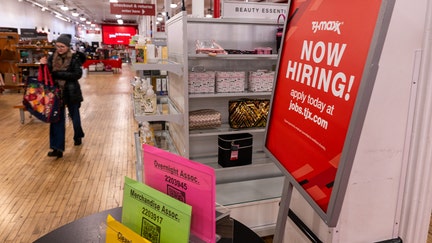 A 'now hiring' sign is displayed in a retail store on Jan. 5, 2024 in New York City. 