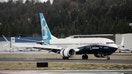 A Boeing 737 Max 8 airliner lands at Boeing Field to complete its first flight on Jan. 29, 2016 in Seattle, Washington.