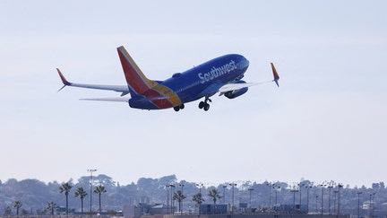 FILE PHOTO: A Southwest Airlines passenger flight takes off from San Diego International Airport in San Diego, California, U.S., February 3, 2023. REUTERS/Mike Blake/File Photo

