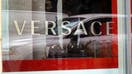 A sign marks the location of a Versace store on August 10, 2023 in Chicago, Illinois. Tapestry, the luxury fashion company that owns Coach and Kate Spade, has purchased Capri Holdings, the parent of Versace and Michael Kors. 