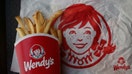 Wendy&apos;s Co. french fries are arranged for a photograph at a restaurant location in Mt. Vernon, Illinois, U.S., on Wednesday, July 29, 2015. Wendy&apos;s Co. is scheduled to release quarterly earnings on August 5. Photographer: Luke Sharrett/Bloomberg via Getty Images
