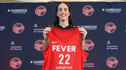 Caitlin Clark #22 of the Indiana Fever poses for a photo during her introductory press conference on April 17, 2024 at Gainbridge Fieldhouse in Indianapolis, Indiana. 