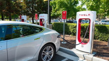 Tesla automobile plugged in and charging a Supercharger rapid battery charging station for the electric vehicle company Tesla Motors, in the Silicon Valley town of Mountain View, California, August 24, 2016. 