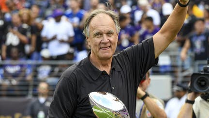 BALTIMORE, MD - SEPTEMBER 29: Former Baltimore Ravens head coach Brian Billick is introduced to the crowd and shows the Super Bowl trophy won in 2000 prior to the game against the Cleveland Browns on September 29, 2019, at M&amp;T Bank Stadium in Baltimore, MD.  (Photo by Mark Goldman/Icon Sportswire via Getty Images)